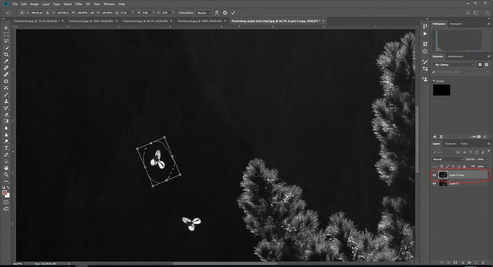 Una captura de pantalla de formas en movimiento utilizando la herramienta de parche de Photoshop
