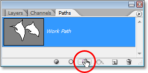 Haciendo clic en el icono 'Cargar ruta como selección' en la parte inferior de la paleta Trazados.