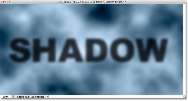 El texto de la sombra borrosa ahora es completamente visible.  Imagen © 2012 Photoshop Essentials.com.