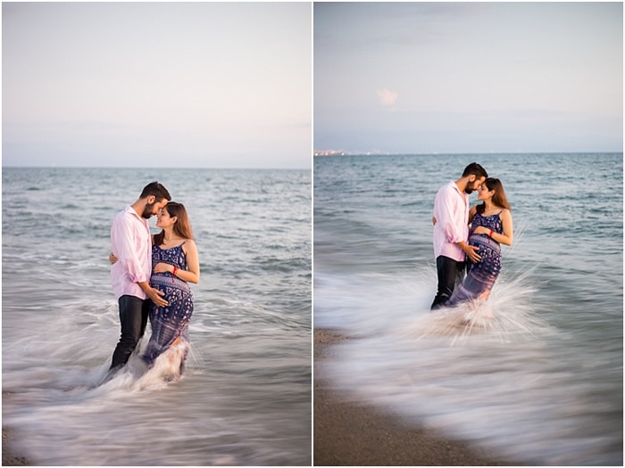 sesión de fotos de maternidad romántica, pareja de pie en el mar
