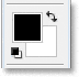 La paleta Herramientas que muestra los colores blanco y negro predeterminados para el primer plano y el fondo
