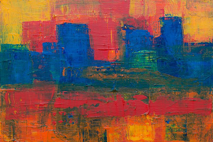 Una pintura abstracta de colores brillantes con una fotografía de textura gruesa de empaste de la pintura