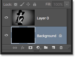 El panel Capas después de reproducir la acción con el color de fondo establecido en negro.  Imagen © 2016 Photoshop Essentials.com