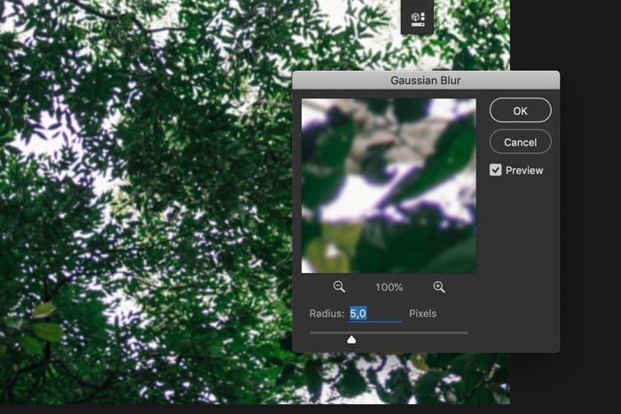 una captura de pantalla que muestra cómo aplicar el desenfoque gaussiano en Photoshop para eliminar la aberración cromática