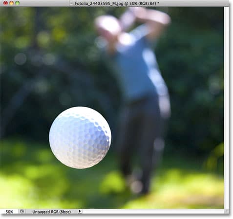 Una foto de una pelota de golf.  Imagen con licencia de Fotolia por Photoshop Essentials.com