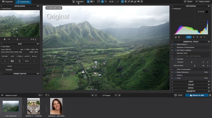Captura de pantalla de la interfaz del software Lightroom Alternative DxO Photo Lab con una foto de un paisaje verde exuberante de un valle de montaña