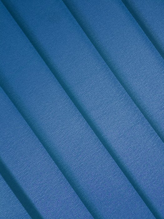 Una composición abstracta de hojas de papel de color azul - ideas creativas de fotos abstractas