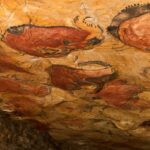 Foto de una pintura rupestre en las cuevas de Altamira que representan bisontes