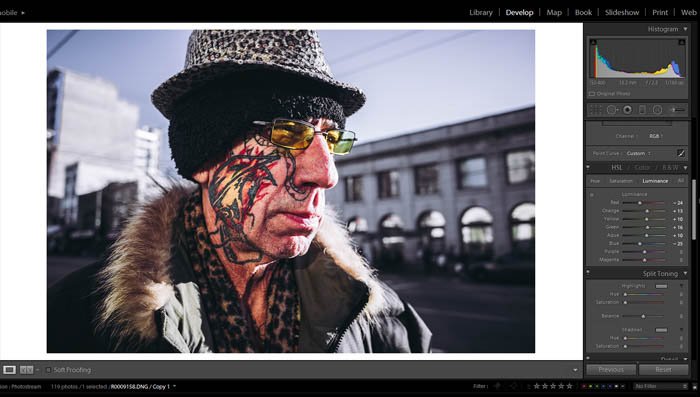 edición de fotografía callejera - tono, saturación y luminancia - imagen de un anciano con un tatuaje facial interesante y anteojos coloridos