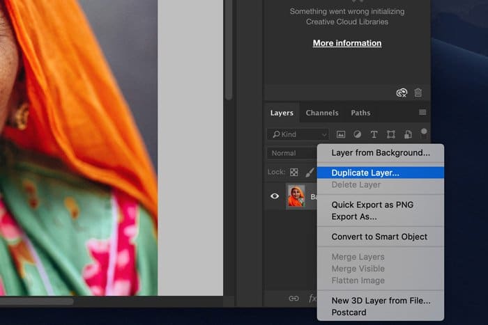 Una captura de pantalla que muestra cómo duplicar la capa de fondo en Photoshop